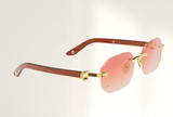 Lunettes de luxe de soleil Dyades dorée - Verre dégradé rouge clair rock - Bois Bubinga - Vue profil