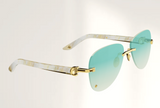 Lunettes de luxe de soleil Dyades dorée - Verre dégradé vert mirage - Corne Blanche - Vue profil